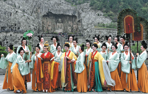 A panoramic view of the Longmen Grotto layout, showing the caves carved into the West Hill along the Yi River.
